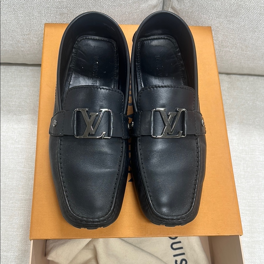 Louis Vuitton Black Men's Loafers silver logo.

Worn twice. Like brand new